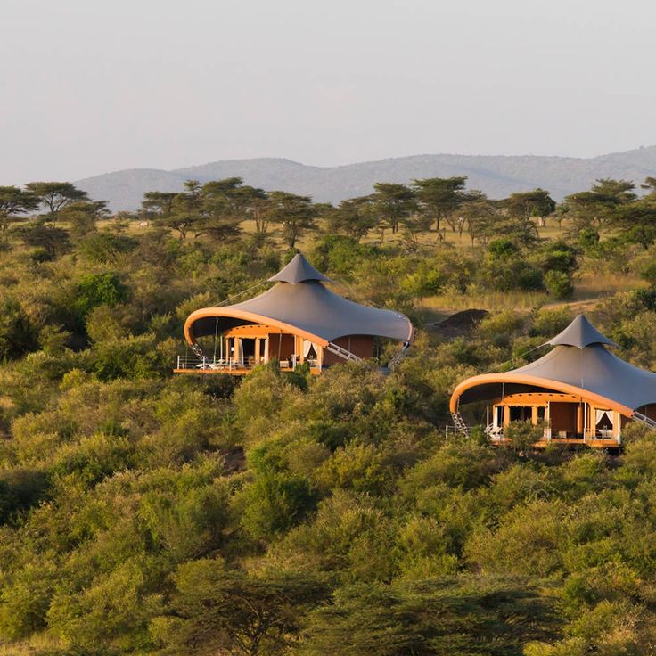 Luxury tented safari camp in the Masai Mara at sunset